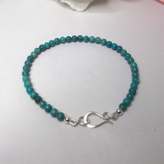 Turquoise gemstone bracelet of small round beads with recycled sterling silver clasp