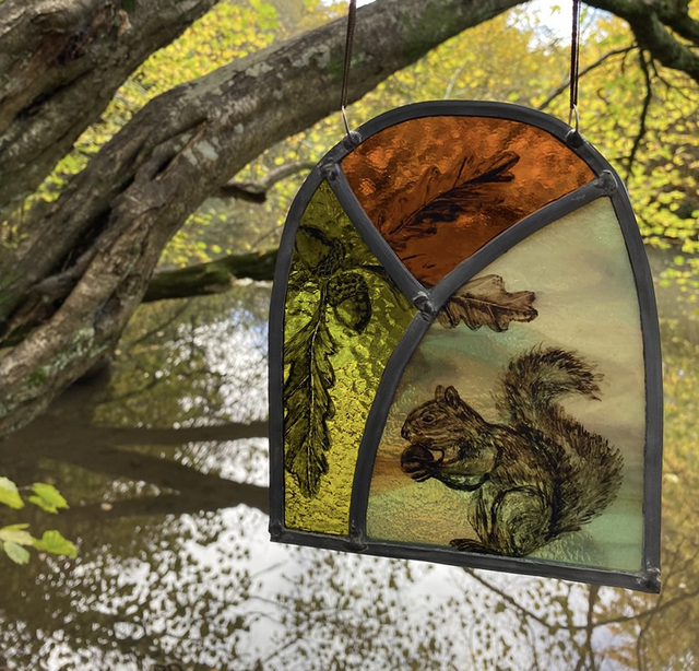 Squirrel stained glass arch