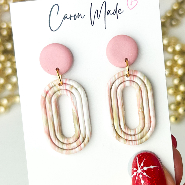 Pink and white oval donut shape