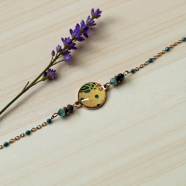 bracelet acier inoxydable motifs japonais bleu beige et doré