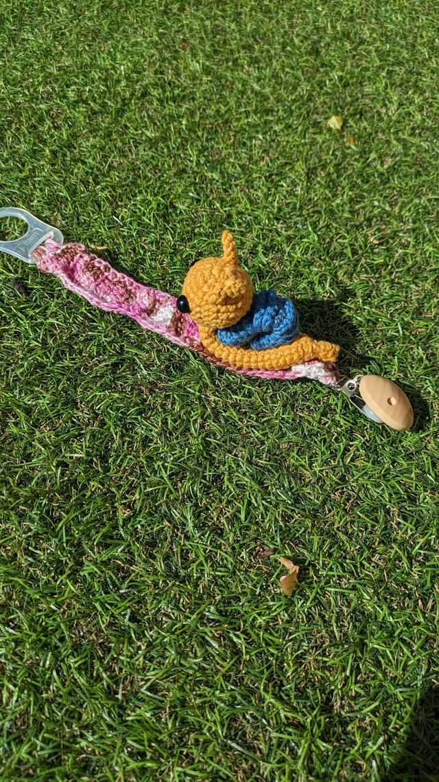 Attache tétine escargot