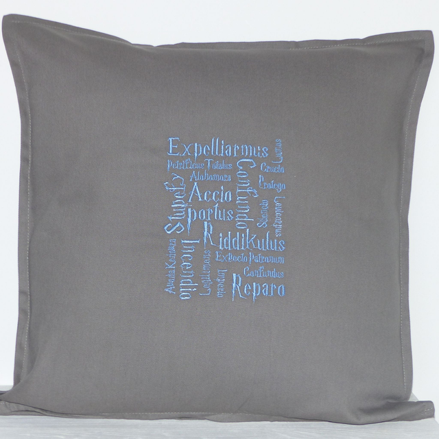 Kissenhülle grau „Zaubersprüche“