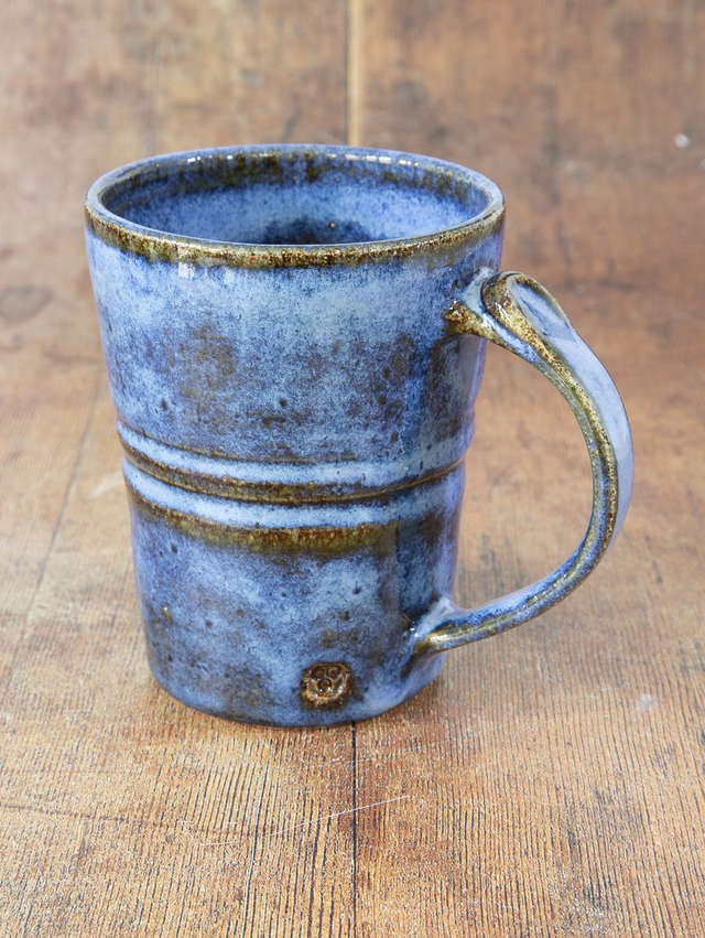 Straight sided coffee mug in blue and brown