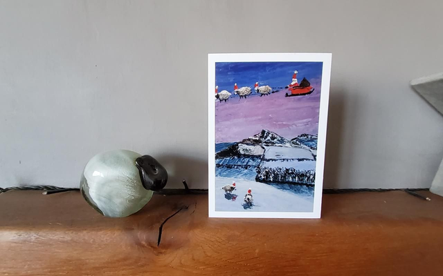 Father Christmas and his flying sheep over Roseberry Topping. A6 card. 
