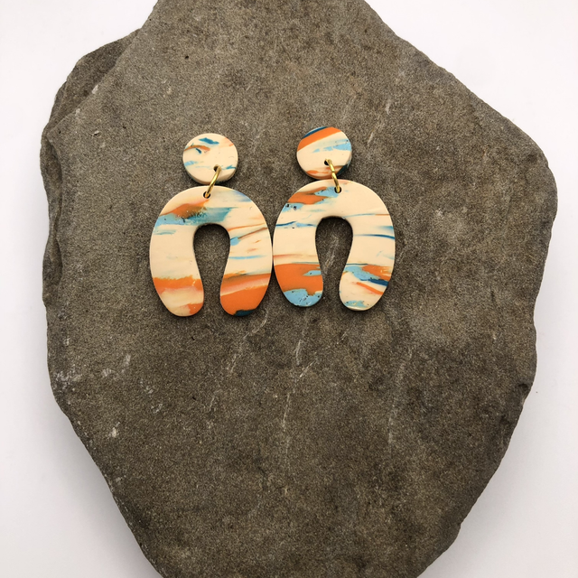 Recharge statement arch earrings 