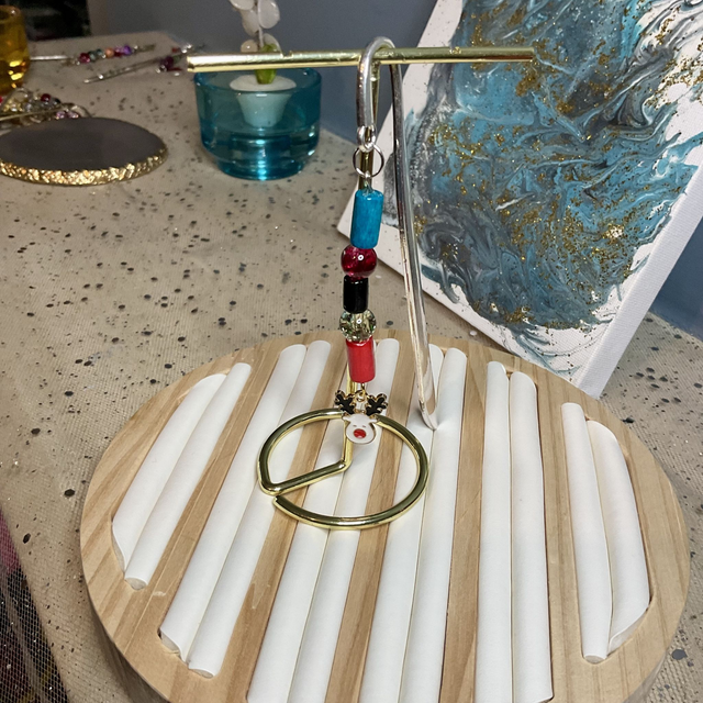 Metal bookmark with Christmas beads and charms.