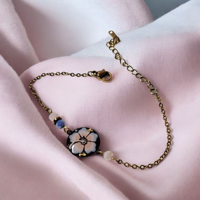Bracelet dessiné Flora acier inoxydable rose et bleu saphir clair
