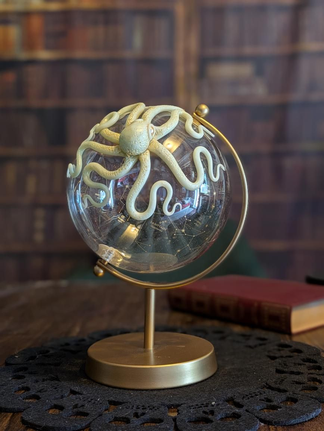 Globe céleste pieuvre phosphorescente bleu