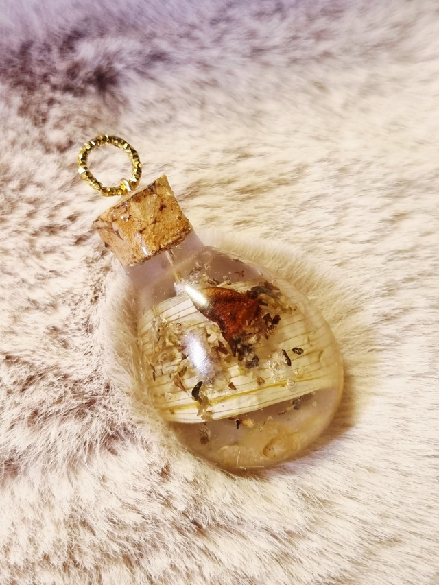 Le Pendentif Potion #52 - Joie