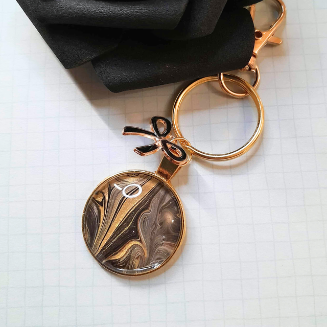 GALA - Bijou de sac - Métal doré, ruban noir