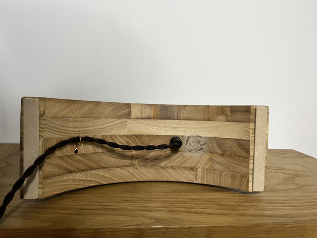 Stylish decorative lamp made of Paulownia wood with a 3D light bulb.