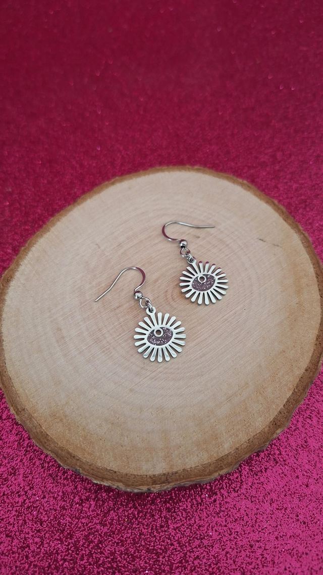 Boucles d&#039;oreilles soleils œils argentées paillettes violettes 
