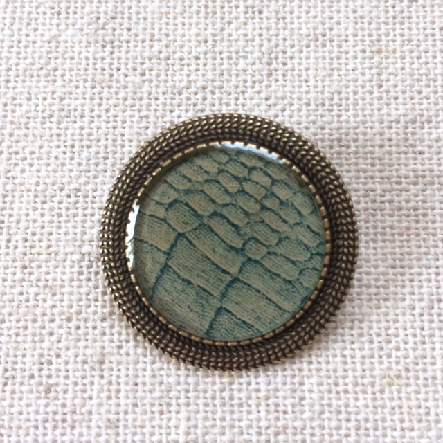 Broche support bronze, papier bleu gris verdâtre 