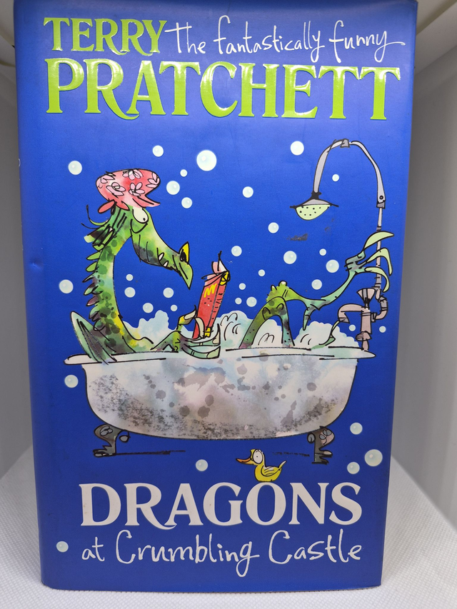 Terry Pratchett - Dragons at Crumbling Castle - First Edition, First Print