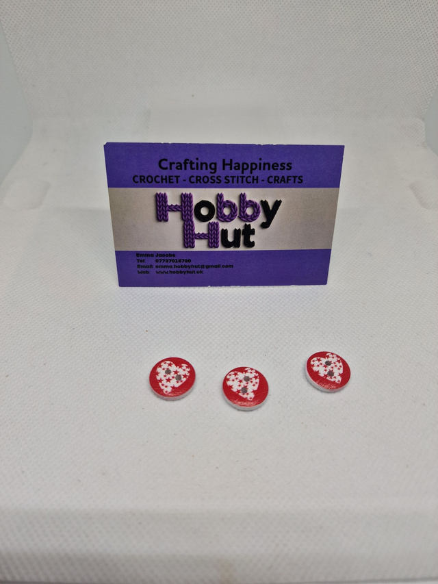 Red Buttons With One Red Heart And Stars