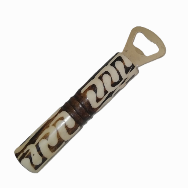Hand carved bottle opener
