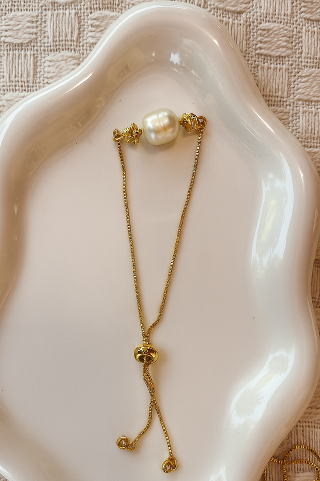 Bracciale in argento 925 e successivamente oro 24k con perla e fiorellini in areg placcato oro 24k