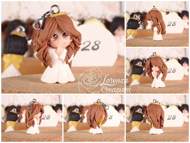 Angioletto custode tascabile n.
28 Portachiavi o charm, artigianale, pezzo unico. Modellato a mano argilla polimerica, made in Italy.