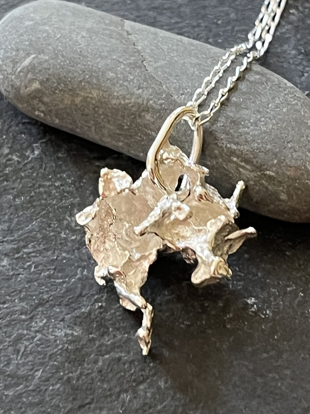 Molten Drift: Organic Salt Cast Recycled Silver Pendant