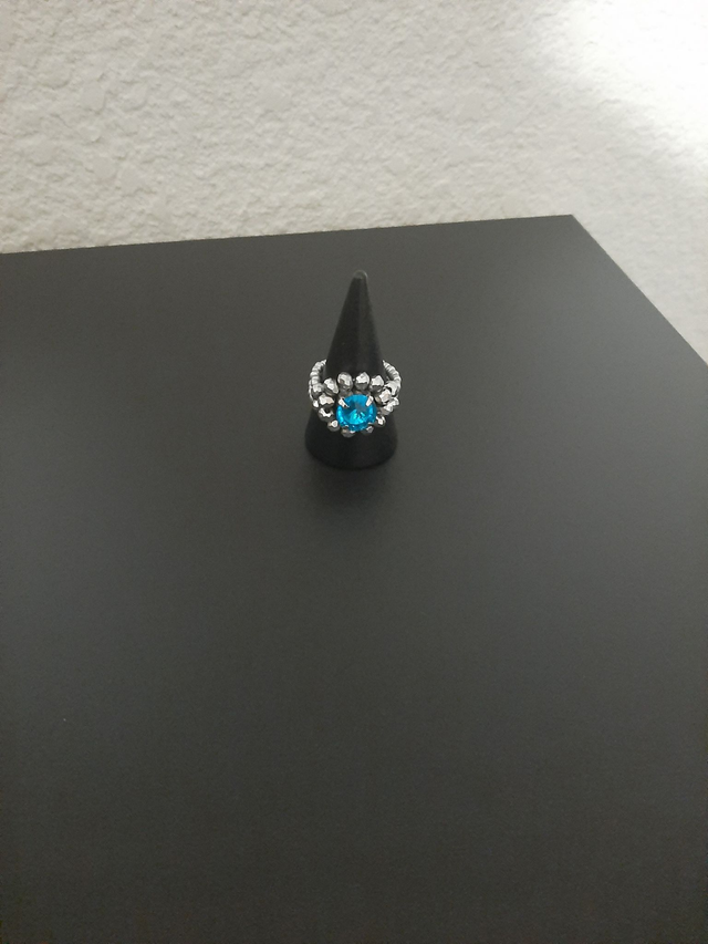 bague imite bleu saphir avec strass en perle cristal argenté		 		