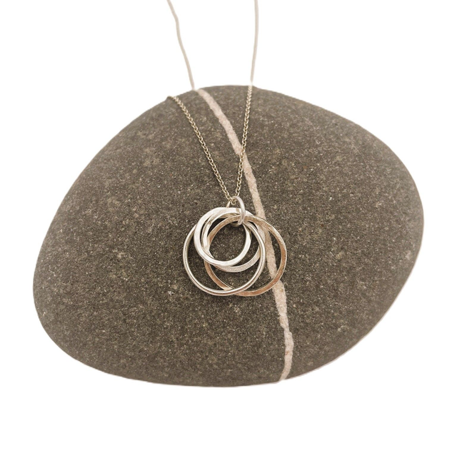 Evermore, family pendant of 4 interwined hoops - sterling silver