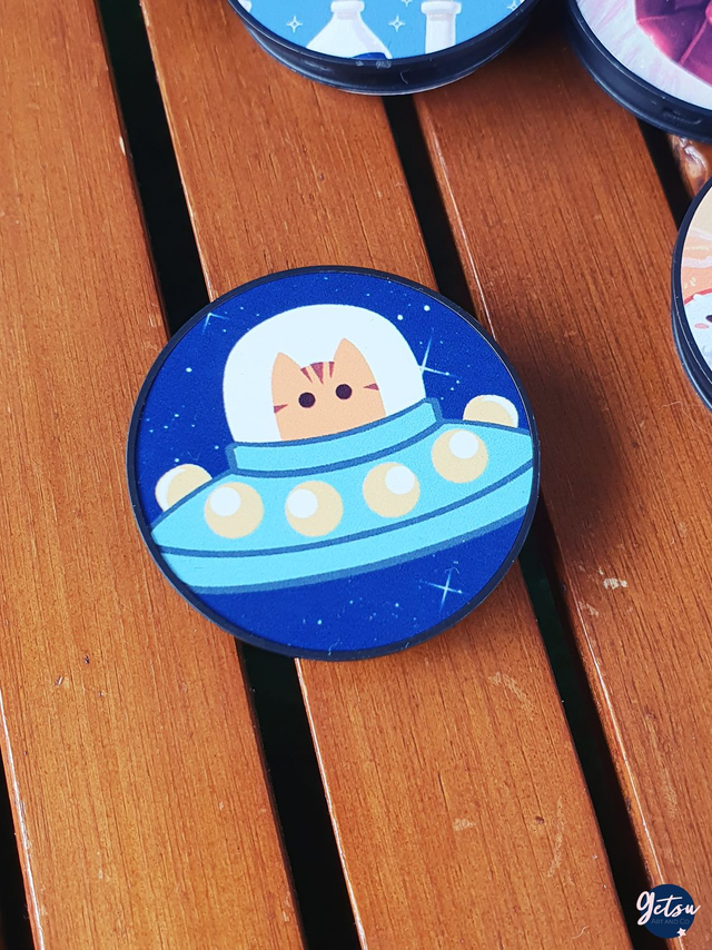 Poignée de téléphone chat de l&#039;espace bleu et orange