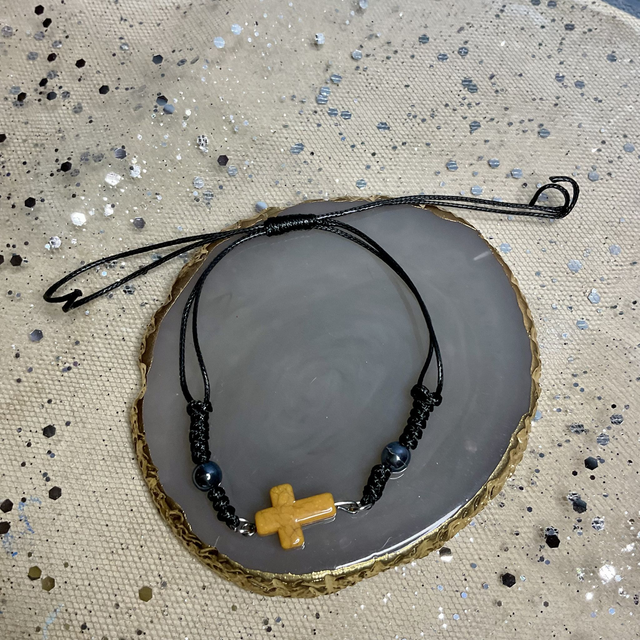 Adjustable bracelet with quartz cross. Fully adjustable cord bracelet.  