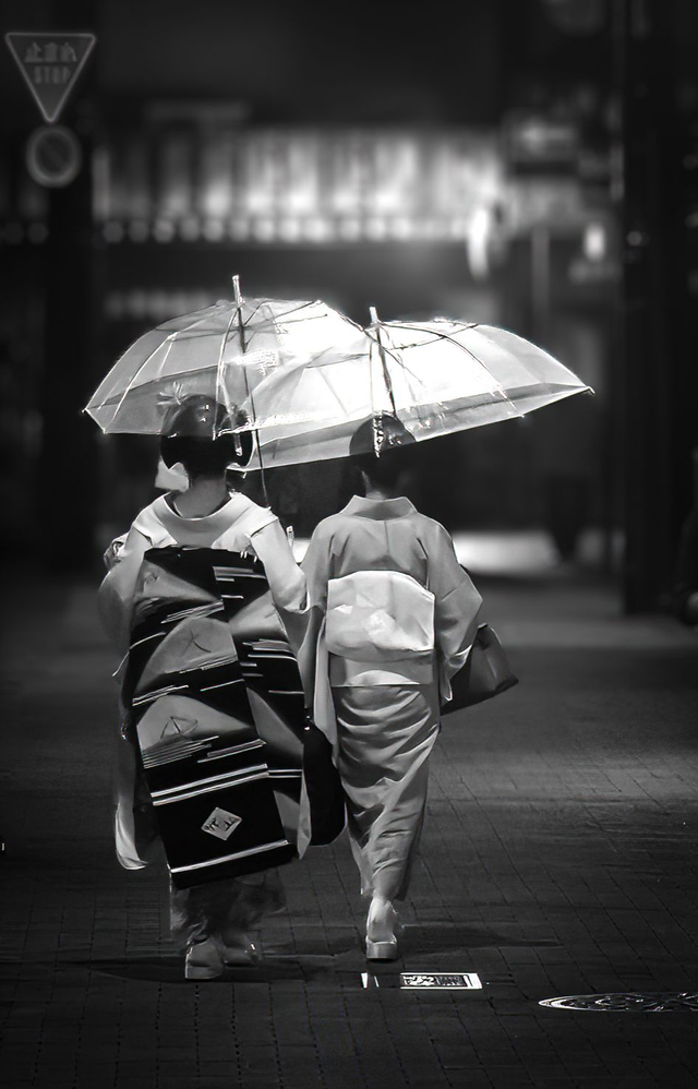 Geisha and Okaasan: Home in the Rain