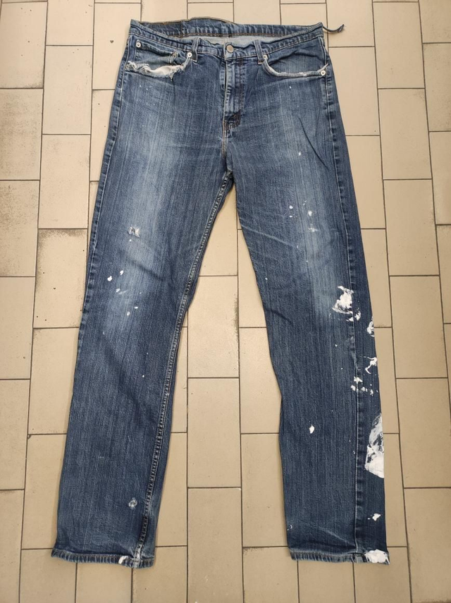 Reworked denim pants with print 