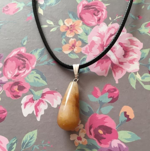 Yellow Jade Pendant on 17”-19” Leatherette Black Cord 