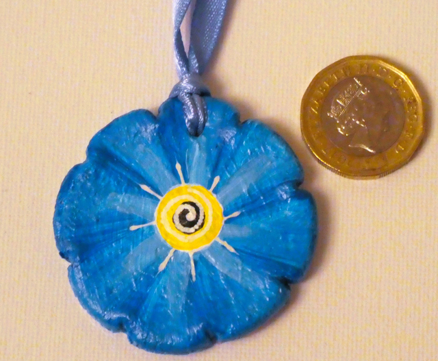 Wonderful "Animal Inspirations" Hanging Gift. "Forget- Me -Not". With an inspirational motto on the reverse.