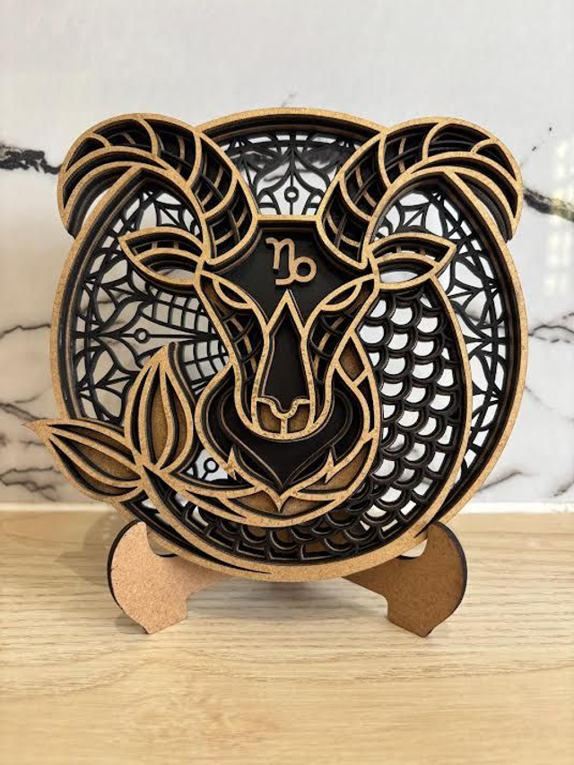 Capricorne Or sur Noir 