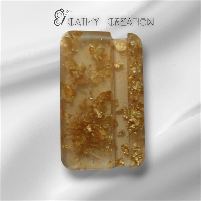 Support téléphone avec inclusion de feuilles d' or 