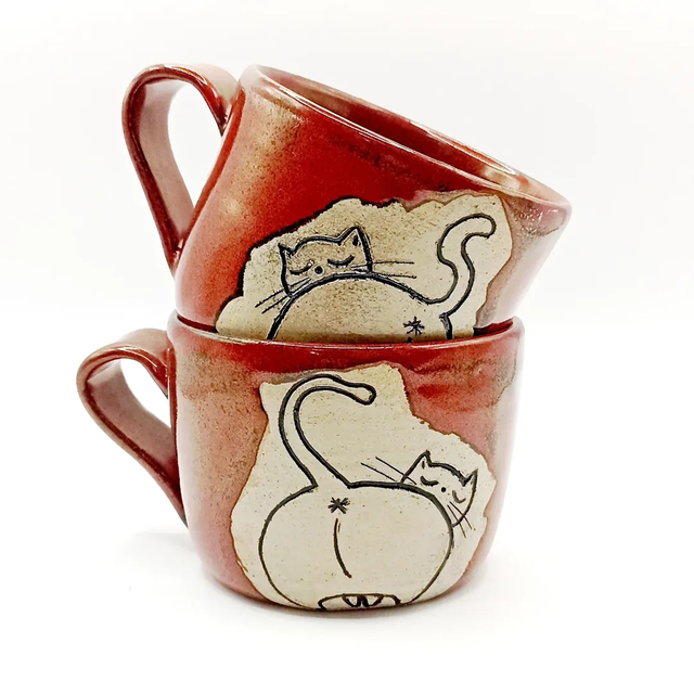 The cheecky cat mugs