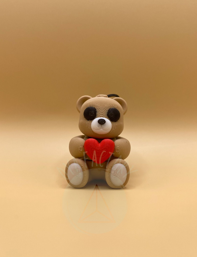 Porte-clés mini Ourson articulé avec coeur rouge