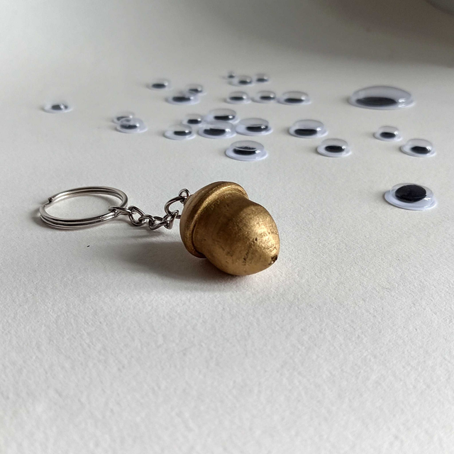 Porte clés gland doré