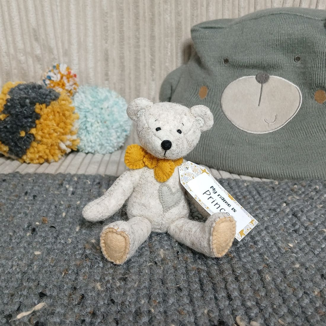 Prince. Miniature size, handmade teddy bear. UKCA. Tray base packaging. Standard Wool Felt. Beige. Mustard. Grey. Sand.