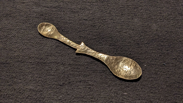 Hammered brass double ended spoon