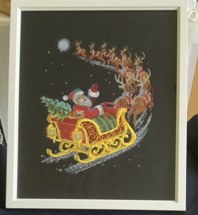 Santa in flight with reindeer 