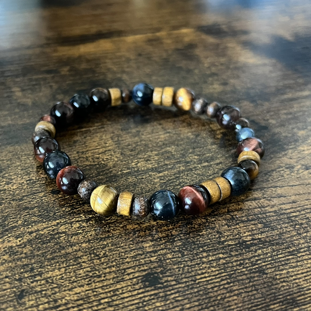 Bracelet 3 oeils et perles de bois 