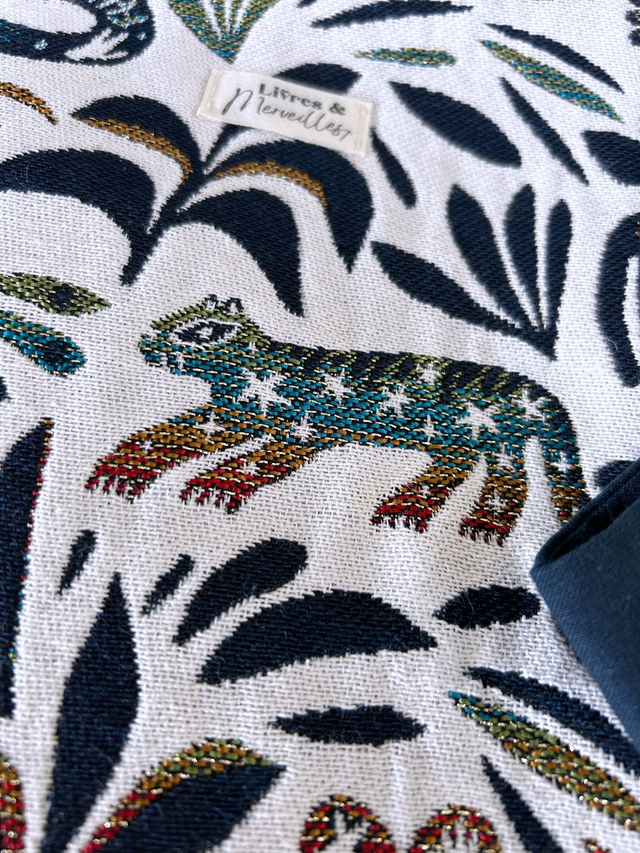 Pochette à livres en tissu jacquard Nysa, fermeture latérale avec un nœud bleu