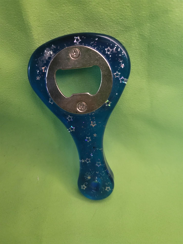 Decapsuleur bleu étoilé