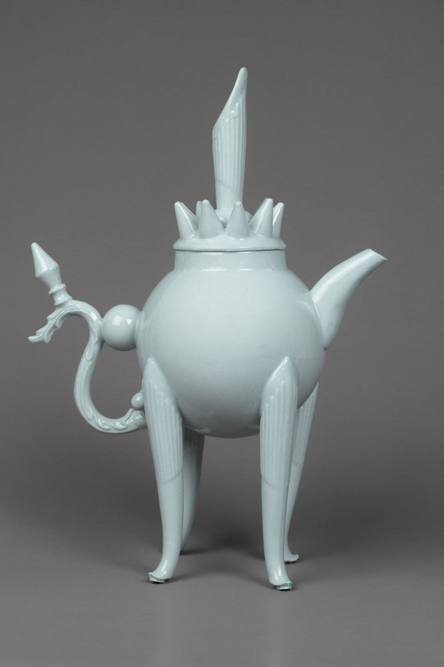 Celadon with spout finial with plastic pieces 