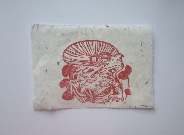 Red toad linocut on mulberry paper