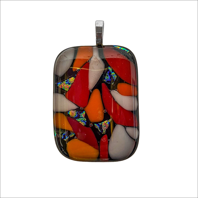 Pendant with orange, red and white and rainbow dichroic fused glass on black background (Ref P16)