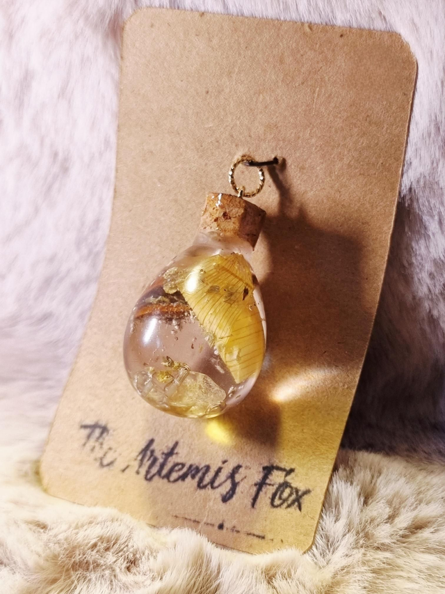Le Pendentif Potion #57 - Joie
