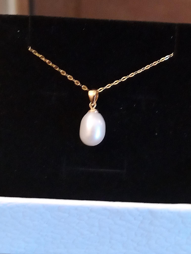 Pendentif perle de culture vermeil.