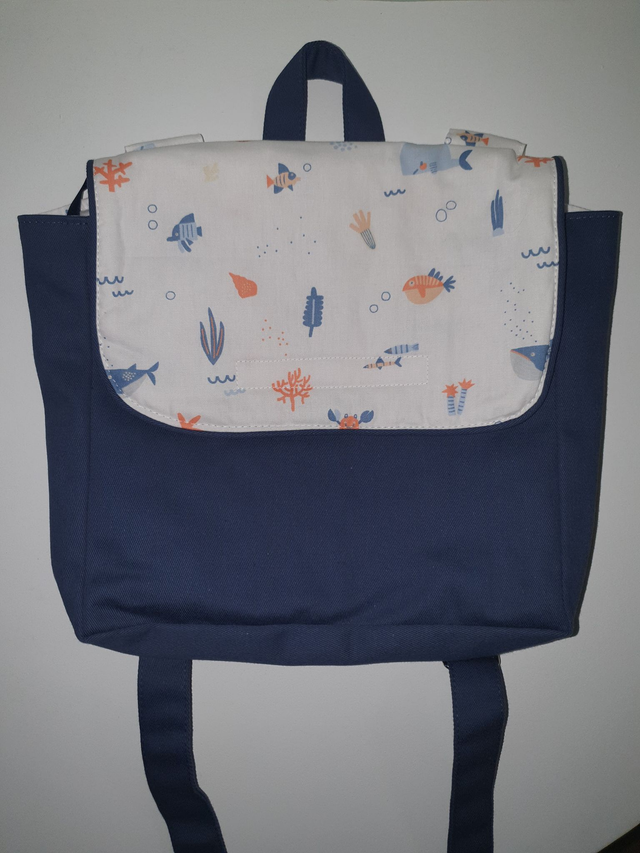 Sac à dos bleu marine et poissons