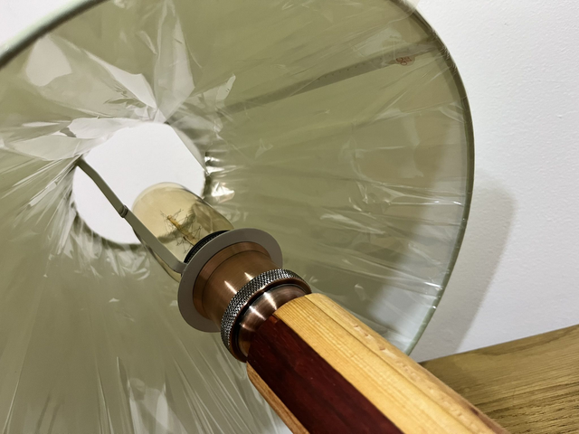 Retro-style bedside lamp made of four types of wood.
