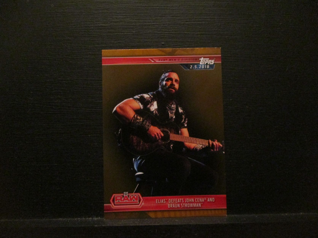 Elias Defeats John Cena And Braun Strowman - Brown Champions Original Trading Card #25